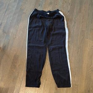 Lola and Sophie black silk joggers with white stripe on the sides